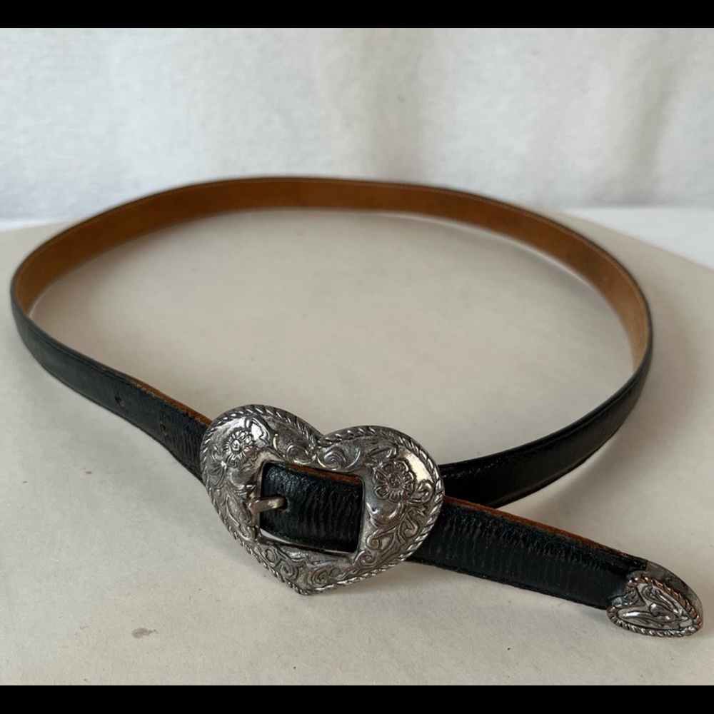 Vintage Justin leather cowhide belt 32 with a metal heart buckle 1991 western
